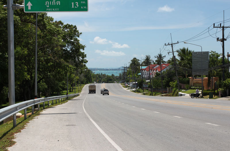 Hilltop road view with Chalong Bay in background